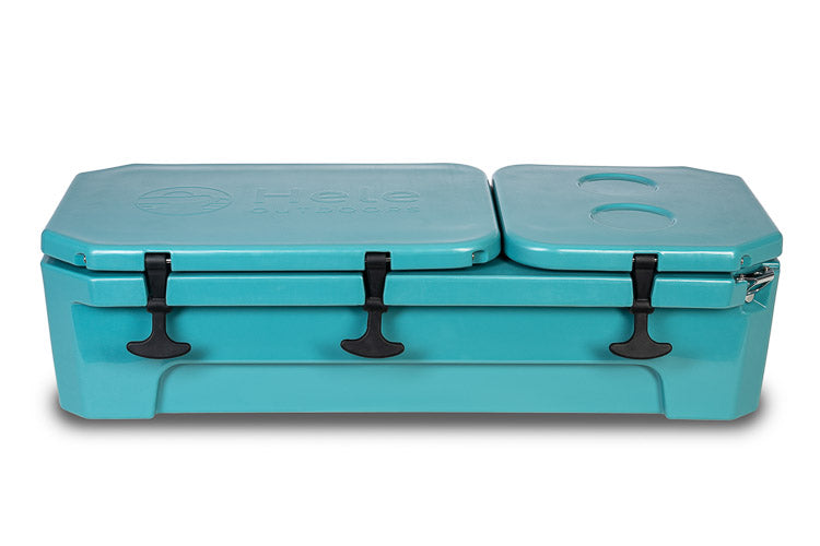 A turquoise blue plastic pet crate with two hinged lids and black latch closures, shown on a plain white background.