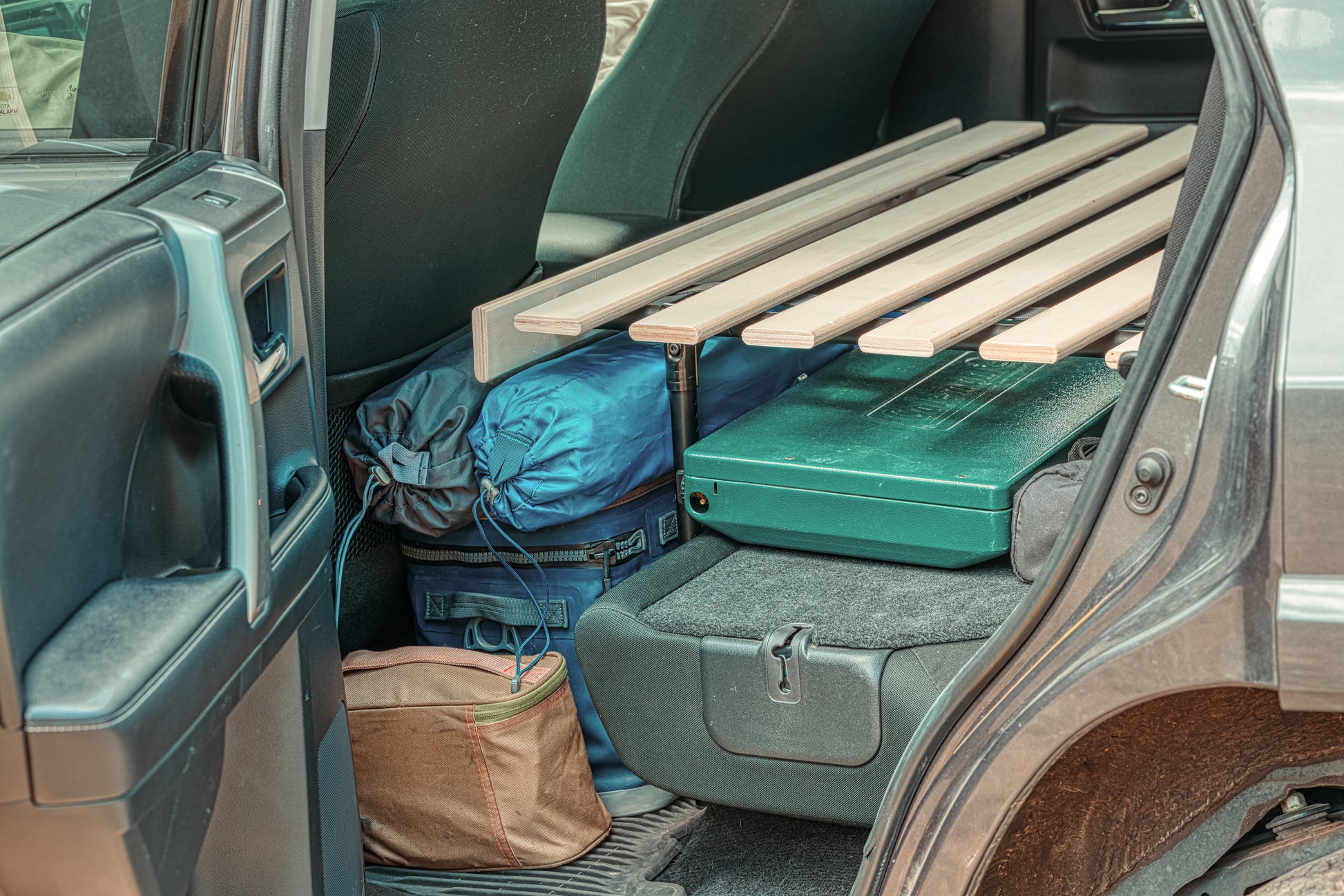 Car camping platform with gear storage